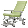 Image of Bariatric Clinical Recliner Chair with Castors 250kg Capacity angled view showing reclined position, green upholstery, sturdy frame