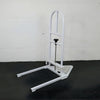 Image of Bed Assist Rail with Floor Support Frame installed beside bed height support rail with sturdy floor frame