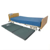 Image of Bedside Fall Protection Safety Mat | Cobalt Crash Mat placed beside hospital bed for fall protection