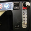 Image of DeVilbiss 1025 10 Litre Home Oxygen Concentrator close up of flow meter control and reset switch