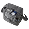 Image of Drive VacuAide 7325 Portable Medical Suction Machine shown inside open black carrying case with gauge visible