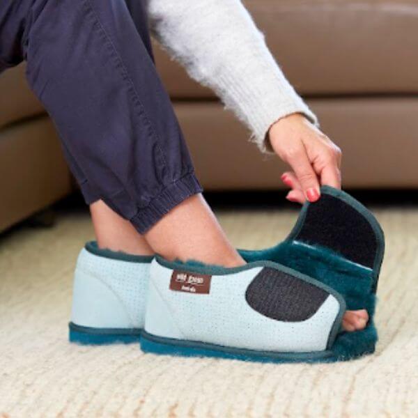 Man Strapping sheepskin open toed care boot