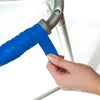 Image of Non Slip Grip Tape for Handles, Tools, and Mobility Aids blue wrap applied to walker frame handle for secure grip