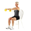 Image of THERABAND Soft Weighted Exercise Balls for Strength & Rehab elderly woman seated performing arm raise with yellow balls