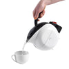 Image of Uccello Easy Pour Electric Kettle with Tipper Base pouring hot water safely