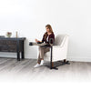 Image of Woman eating a meal at the over chair tray table