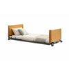 Image of Flexi Floorline Bed with beech head and foot boards at a low height, mattress shown for display