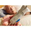Image of Carer using the key to lock the floorline bed handset