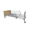 Image of Fold down bed rails fitted to a care bed frame without a mattress