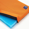 Image of GelComfort cushion with the orange cover opened to show the honeycomb gel inside