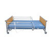 Image of Cobalt K-Dee 3/4 length fold down bed rails raised on a care bed with mattress