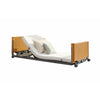 Image of Low electric care bed with the backrest raised, side view