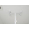 Image of Tension mounted top beam of the floor to ceiling grab bar against the ceiling