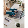 Image of Typing on a laptop wearing teal dext compression gloves