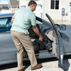 Image of Stander EZ Fold-N-Go Rollator Folded into Front Seat