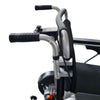 Image of Bruno Heavy Duty All Terrain Electric Wheelchair push handles and attendant control detail