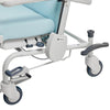 Image of Clinical Convalescent Recliner Chair with Tilt and Legrest close-up of wheel assembly, metal frame, braking casters