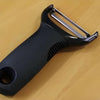 Image of Easy Grip Y-Shaped Vegetable Peeler with wide grip handle on wooden tableg