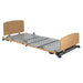 Electric Floorline Aged Care Bed with High Low Adjustment fully lowered bed with wooden headboard and mattress support