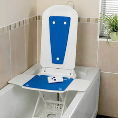 Electric Reclining Bath Lift Seat with Hand Controller installed in bathtub with blue seat pad and remote