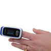 Image of Fingertip Pulse Oximeter for Oxygen Saturation and Pulse Monitoring worn on finger during live reading