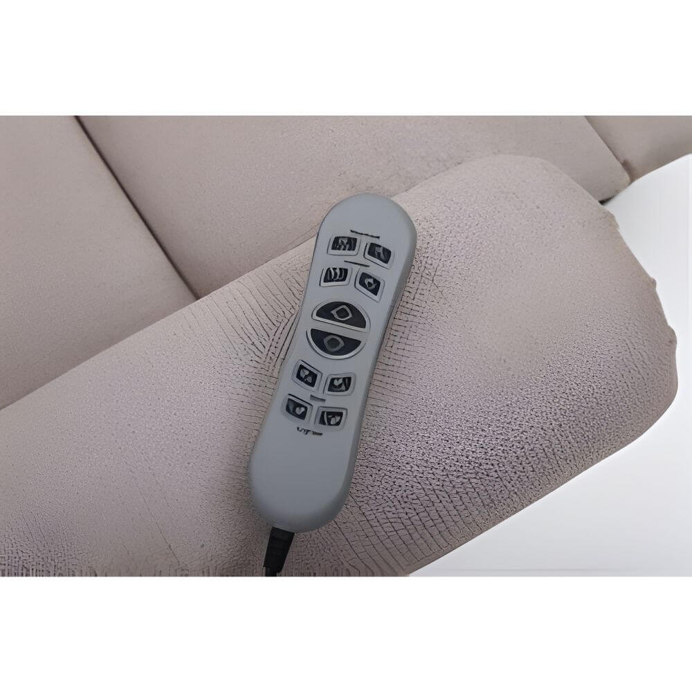 Four Motor Lift Recliner Chair with Adjustable Headrest and Lumbar handheld remote control resting on chair arm