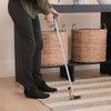 Image of Hip Replacement Recovery Kit with Reacher, Sock Aid, Shoehorn & Sponge reacher tool picking item from floor without bending