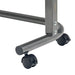 King Overbed Table with Spring Lift 90 x 39cm close-up of castor wheels and metal frame