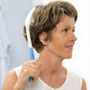 Image of Long Handled Hair Brush and Comb for Limited Mobility Grooming woman using long reach brush for easy self hair care