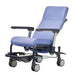 Mobile Clinical Transfer Chair with Reclining Backrest showing reclined position with padded seat armrests and medical casters