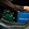 Image of Modular Medical Kit Bag with Colour Coded Pouches stored in car boot for mobile healthcare use