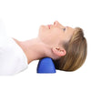 Image of NeckRest at-home neck pain relief device used under forehead for tension headache support