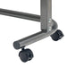 Spring Lift Overbed Table 79 x 39cm close-up of castor wheels and metal base support
