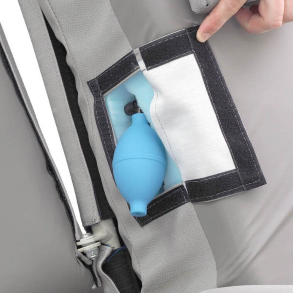 Tilt in Space Chair Bed with Pressure Relief and Recline showing handheld control attached to chair