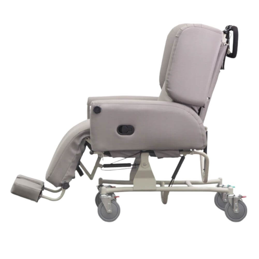 Tilt in Space Chair Bed with Pressure Relief and Recline side view showing tilt mechanism and leg rest