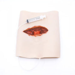 TraumaSim Wearable Open Femur Fracture Wound Simulation with Bleeding