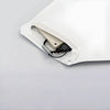 Image of Universal Bed Pressure Sensor Pad for Fall Alert Systems transmitter secured inside pad opening