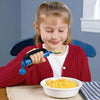 Image of Weighted Spill Resistant Spoon with Stabilising Handle Strap child using adaptive spoon with stabilising hand strap while eating