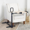 Image of Assist-A-Tray over chair table beside an armchair in the living room