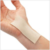Image of beige gel mate silicone gel sheet worn on the wrist
