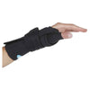 Image of comfort cool wrist and thumb cmc restriction splint worn on the hand