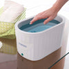 Image of Hand dipping into the therabath pro paraffin wax bath