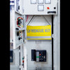 Image of LV rescue kit bag hanging on an open electrical switchboard door