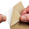 Image of peeling beige silicone gel sheet backing