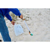 Image of reacher grabber picking up rubbish outdoors