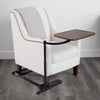 Image of Walnut swivel tray table fitted under an armchair