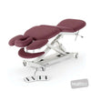Image of SX Contour Massage Table - Mid-Lift Tail-Lift w/Castors in Austex Studio+ Ruby vinyl (AI colour preview)