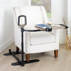 Image of Tray table and stand assist handle beside a white armchair