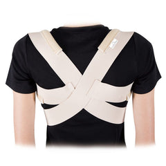 Vulkan posture brace beige cross-back straps worn on the upper back