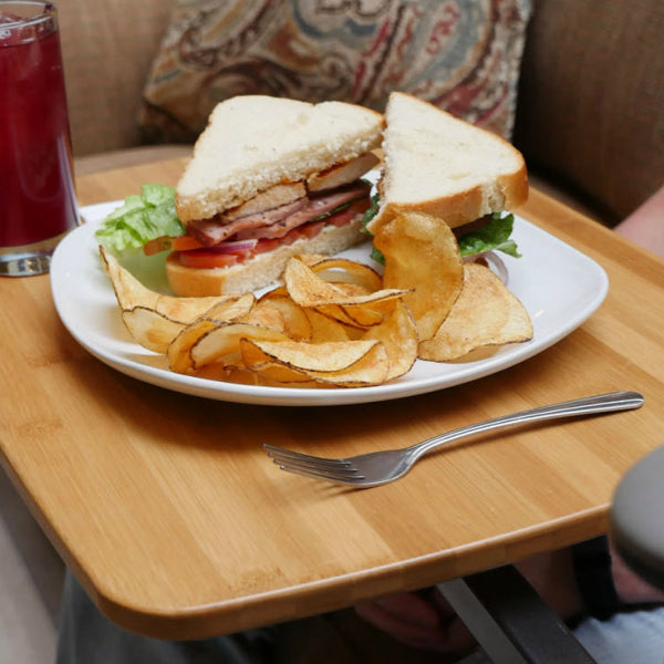 STANDER Omni Swivel Tray Bamboo Table with Plate of Sandwich